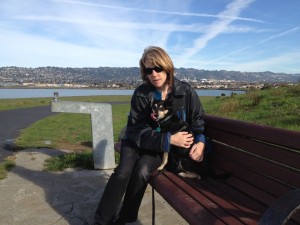 Kathy and her dog enjoying Cesar Chavez Park